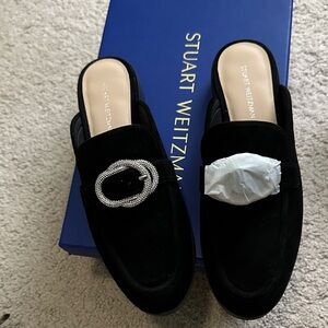 Stuart Weitzman Black Mules with Silver Buckle